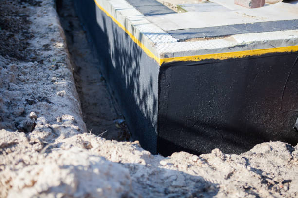 Professional Waterproofing technician working in Waveland, IN